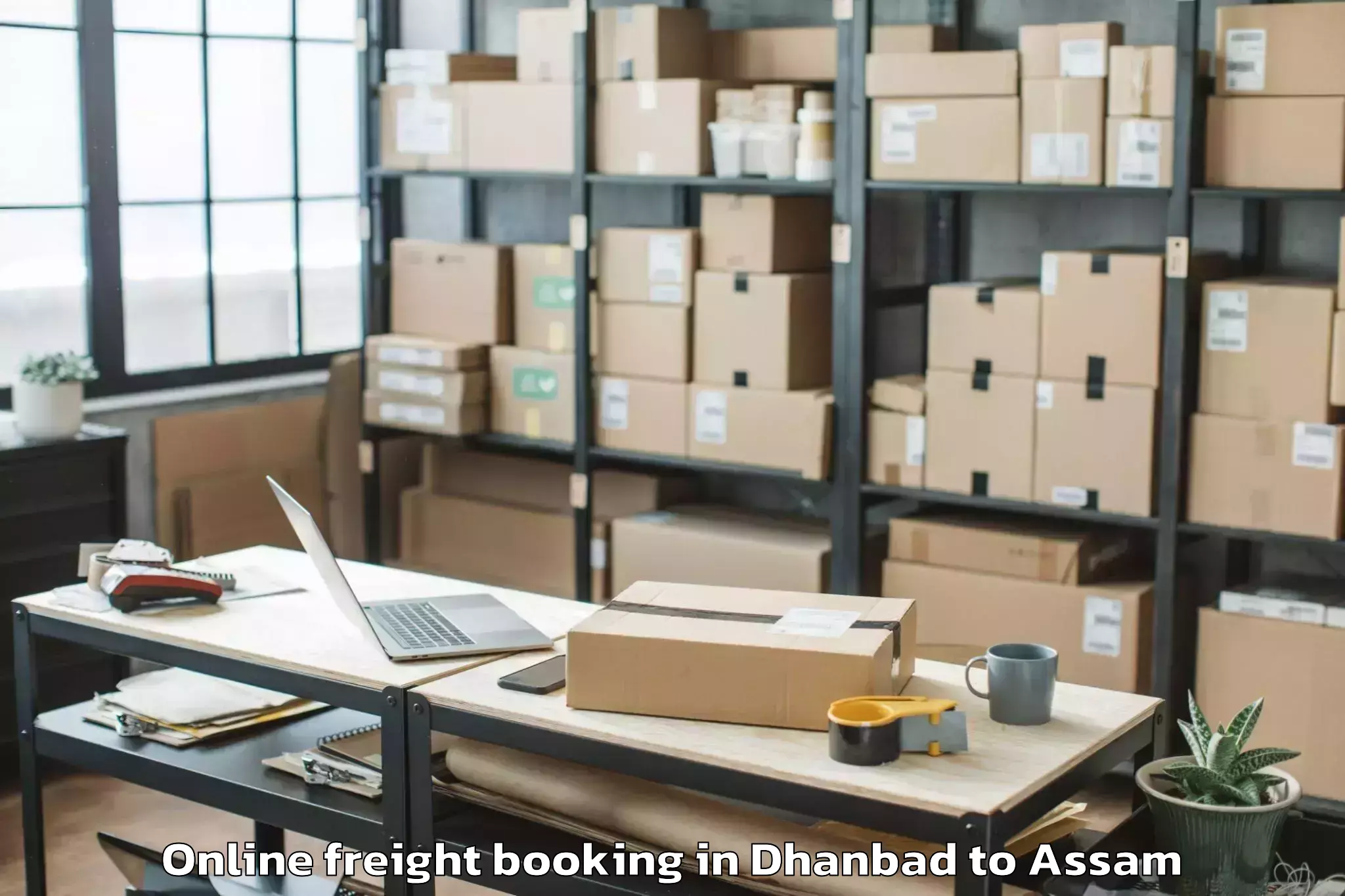 Easy Dhanbad to Borjhar Airport Gau Online Freight Booking Booking